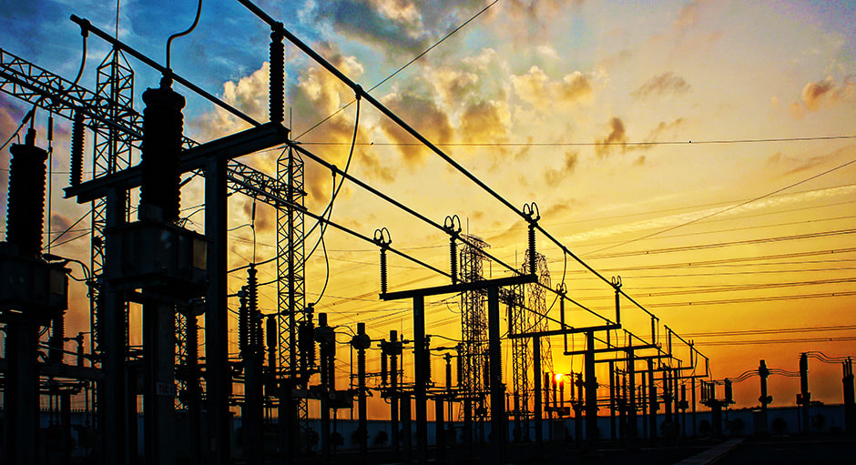 Dusk photo of an electrical distribution substation