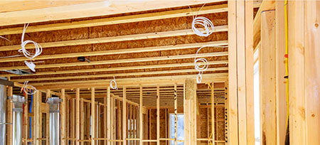 New home construction with wiring installed by an electrical contractor
